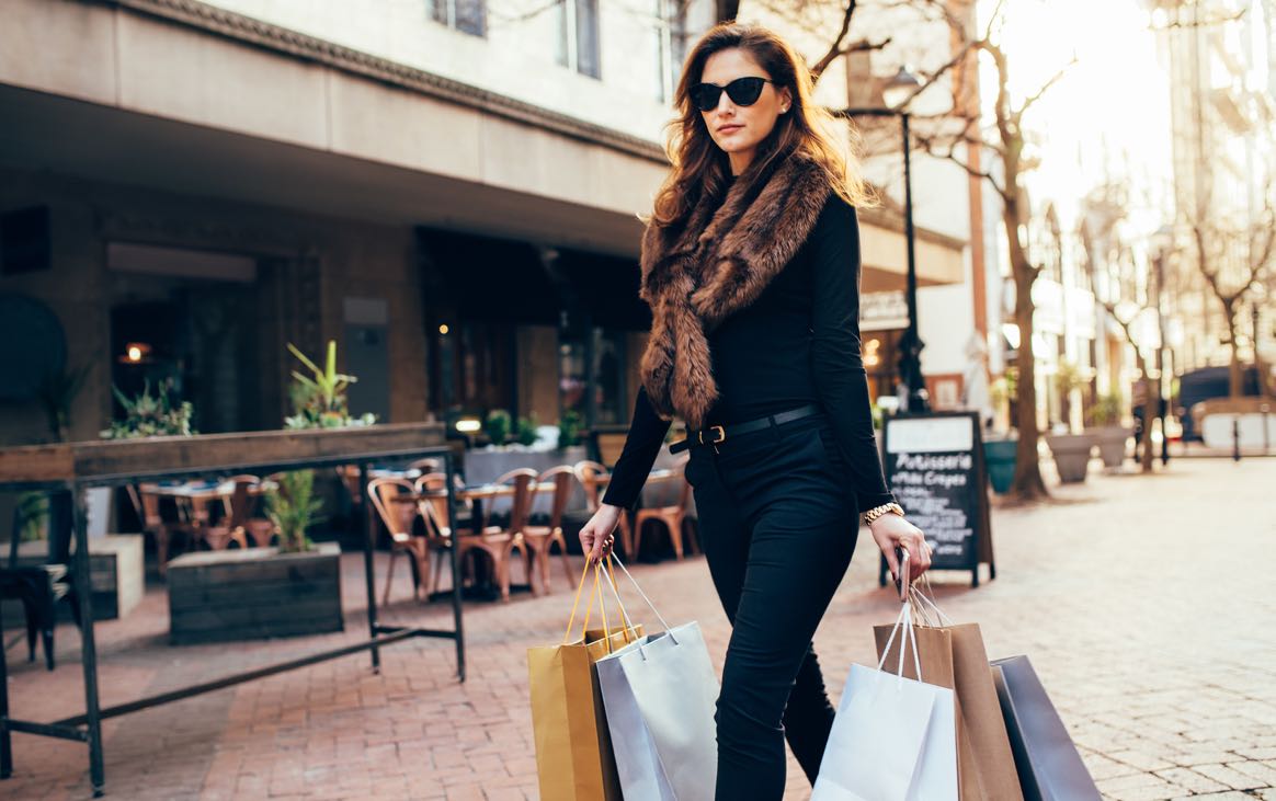 Young woman with shopping bags
